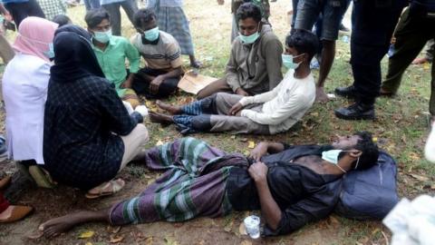 Rohingya refugees are checked by Indonesian medical officers in Aceh province. Photo: 25 December 2022