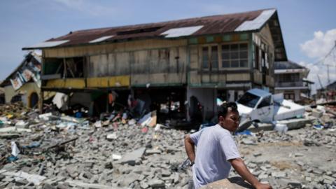 A man stands on a tsunami devastated area in Wani, Donggala, Central Sulawesi, Indonesia, 02 October 2018.