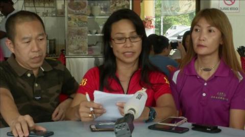 Rescuers in Malaysia giving a press conference