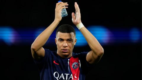 Kylian Mbappe claps his hands