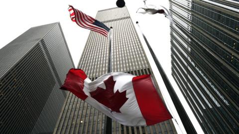 The Canadian flag flies at half-mast at the Consulate General of Canada in New York October 23, 2014.