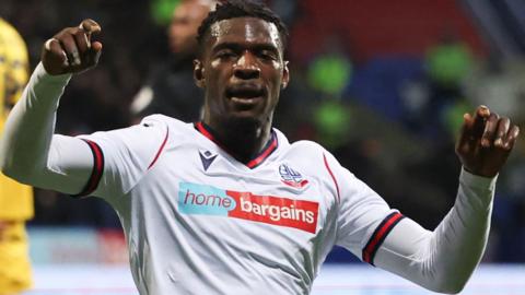 Amadou Bakayoko celebrates a goal for Bolton against Lincoln