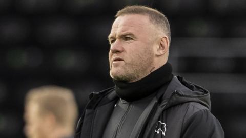 Derby County caretaker boss Wayne Rooney looks on from the sidelines