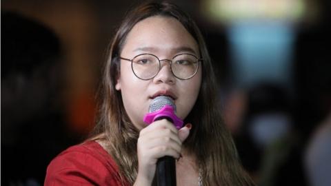 Thai student activist Panusaya Sithijirawattanakul speaks to the media at a police station in Bangkok, Thailand on Aug 14, 2020