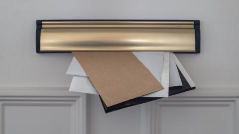 Letters arriving through letterbox