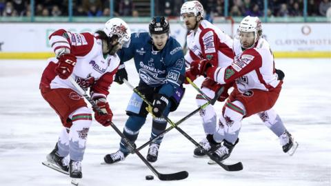 Belfast Giants' Scott Conway is about to challenge Cardiff's Matt Register in Wednesday's final