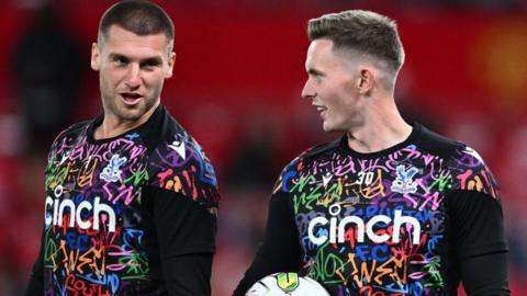 Crystal Palace goalkeepers Sam Johnstone, left, and Dean Henderson, right