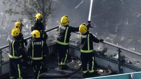 Fire crews at Grenfell Tower on 14 June 2017