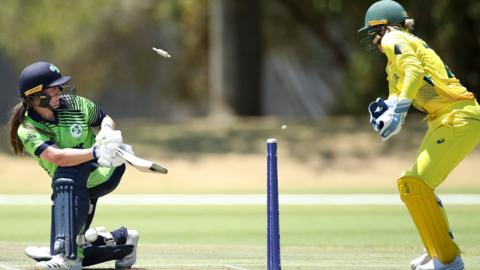 Laura Delany of Ireland is bowled by Heather Graham of Australia during a warm-up match