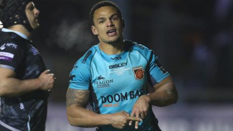 Ashton Hewitt displays his new try celebration after scoring against Ospreys