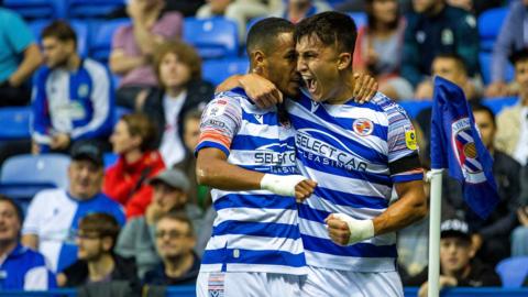 Reading defender Tom McIntyre celebrates his opening goal against league leaders Blackburn