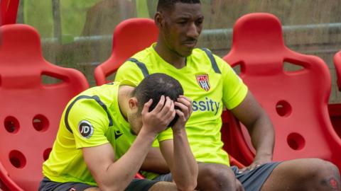 Dejected Flint Town players