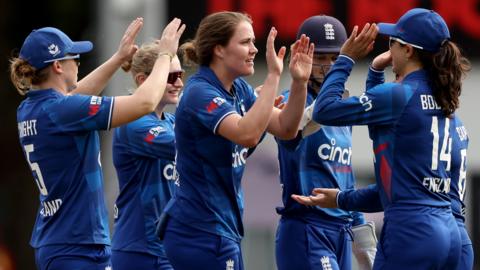 England's Nat Sciver-Brunt celebrates with her team-mates after taking a wicket in an ODI v New Zealand at Hamilton