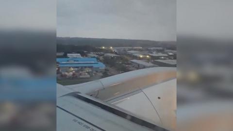 Plane landing at Aberdeen Airport