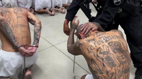 Handcuffs being applied to Elsalvador prisoner