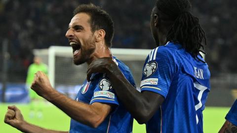 Giacoma Bonaventura celebrates after scoring against Italy
