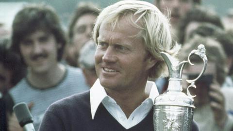 Jack Nicklaus holding the Open trophy after winning the claret jug