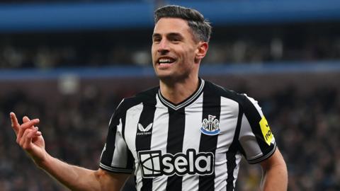 Newcastle defender Fabian Schar celebrates his second goal against Aston Villa