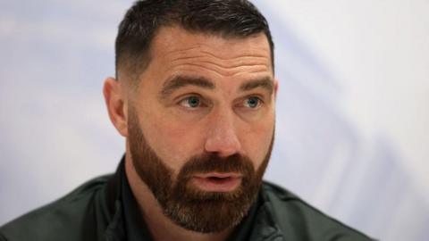 Matty Smith at a press conference in his role as head coach of St Helens women  