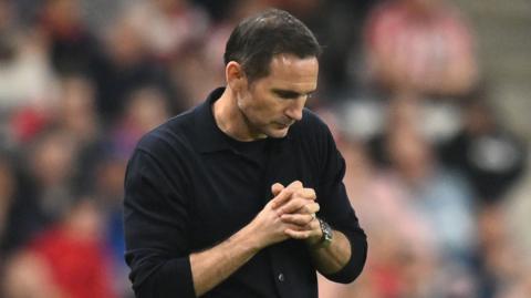 Frank Lampard with hands clasped in prayer
