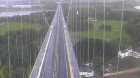 An aerial image taken from a high camera on the M48 Severn Bridge. It shows both lanes of traffic completely empty. 