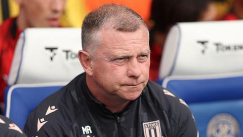 Stoke City manager Mark Robins watching his team lose at Queens Park Rangers