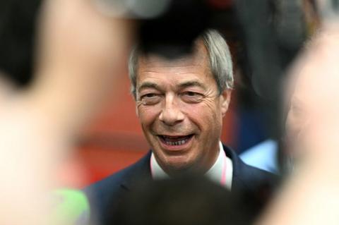 Nigel Farage grinning