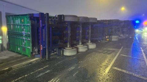 Overturned lorry on a carriageway