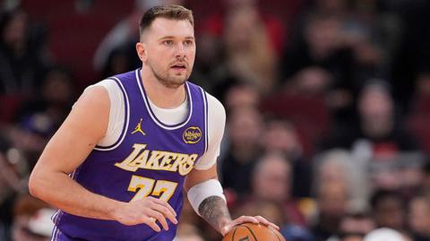 Luka Doncic of the LA Lakers dribbles the ball against the Chicago Bulls