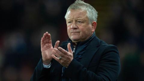 Chris Wilder applauds