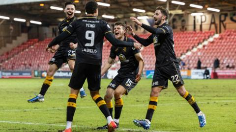 Livingston's Tete Yengi celebrates after scoring to make it 2-0 during a SPFL Trust Trophy Semi-Final match between Dunfermline Athletic and Livingston at the KDM Group East End Park