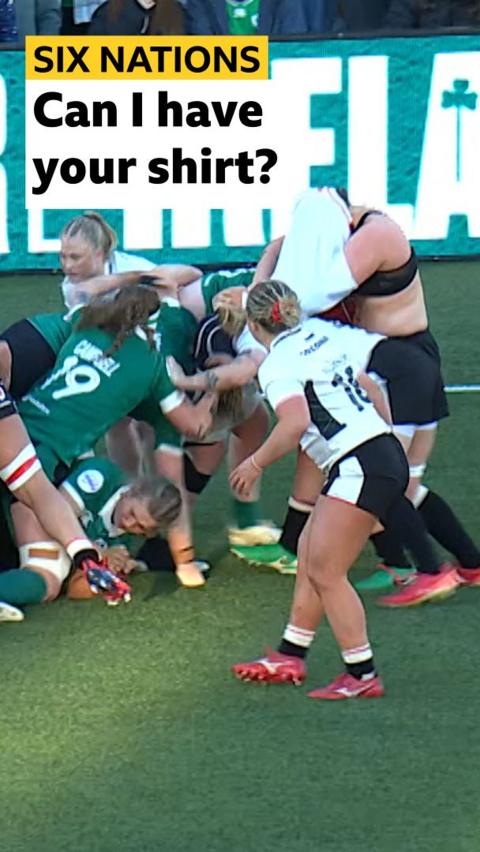 Maisie Davies of Wales loses her shirt amidst a scrum against Ireland 