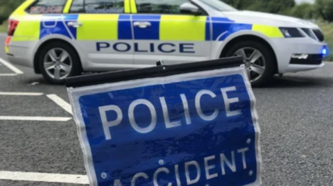 Police Car and Police Accident sign.