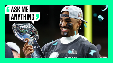 Jalen Hurts holding the Vince Lombardi trophy with an Ask Me Anything border around him