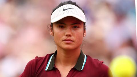 Emma Raducanu looks on at Queen's