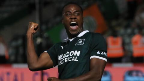 Owen Oseni celebrates scoring