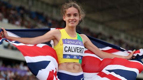 Sarah Calvert poses with a Great Britain flag