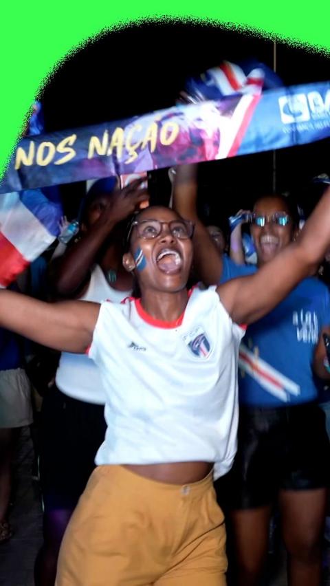 Cape Verde fans celebrating progressing to the knockout stages of the FIFA World Cup.