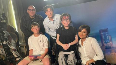 spiderman cast and two children