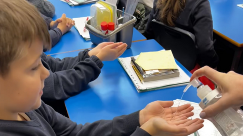 Boy with gel on hands