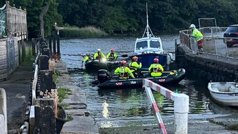 Boats heading out to search