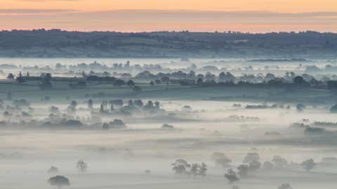 A very low cloud causing mist over the Somerset Levels