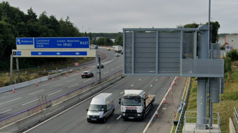 Google Street View image of the M621, showing signs to Middleton, Castleford Pontefract, London, Wakefield and Hull.