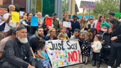 Campaigners gathered for a picture holding a large banner saying "Just say no".