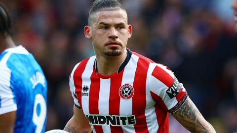 Kalvin Phillips in action for Sheffield United in the derby with Sheffield Wednesday in February