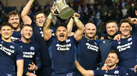 Scotland team celebrate with the 2026 Calcutta Cup