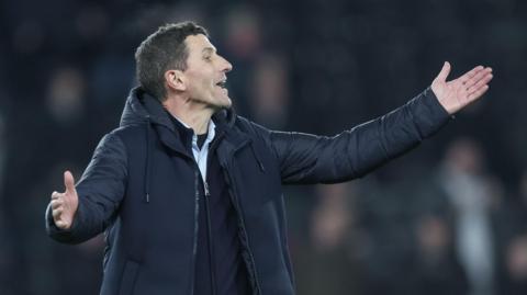 Watford head coach Javi Gracia gestures to his players during the win at Derby County.