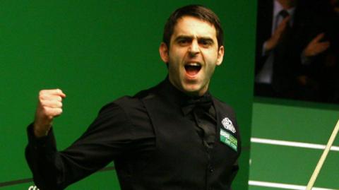 Ronnie O'Sullivan celebrates making a 147 break at the World Championship in April 2008, clenching his right fist and shouting out in delight