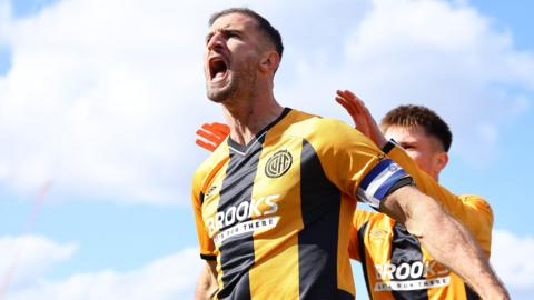 Cambridge United's Dominic Ball celebrates