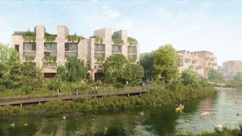 A CGI image of buildings by a river with lots of trees lining the river bank.